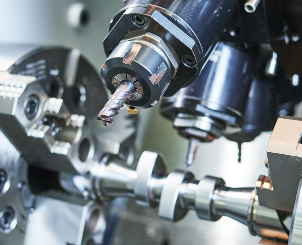 CSS Engineering CNC machine fabricating a precision steel component.