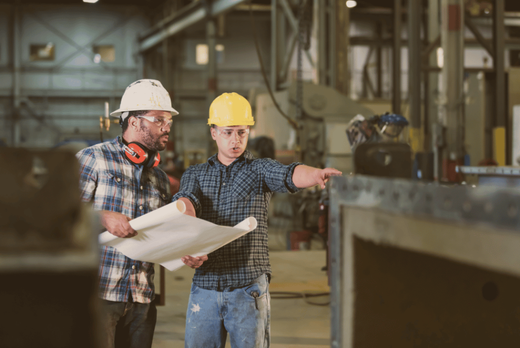 technicians discussing accurate plant deign before fabrication