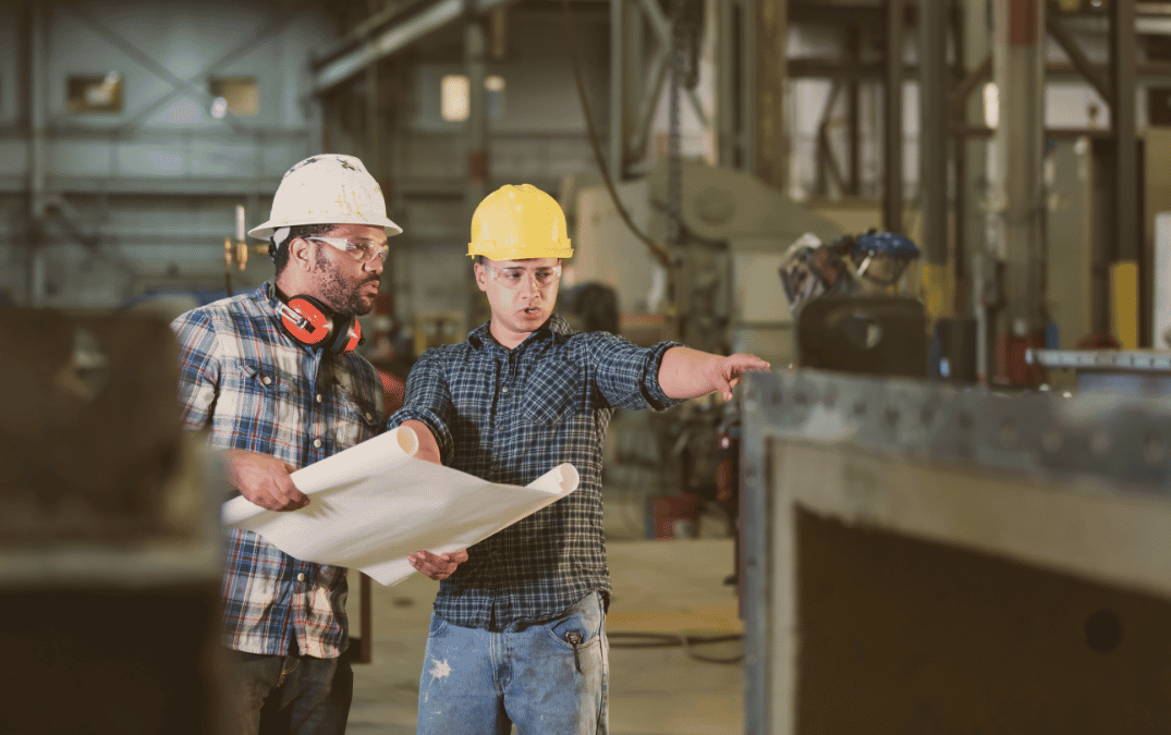 technicians discussing accurate plant deign before fabrication